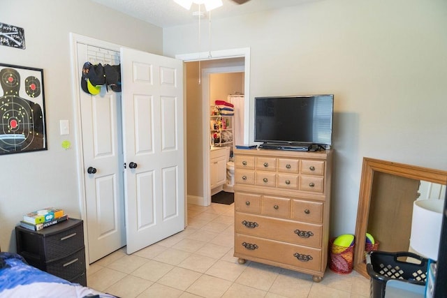 bedroom featuring light tile patterned floors