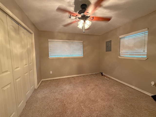 330 Hillcrest Dr, Lumberton, TX 77659 - unfurnished bedroom with a closet, carpet flooring, electric panel, and baseboards