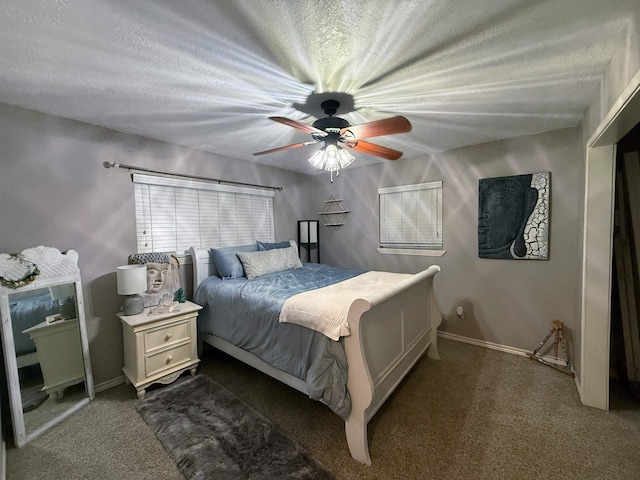 330 Hillcrest Dr, Lumberton, TX 77659 - carpeted bedroom featuring a ceiling fan, baseboards, and a textured ceiling