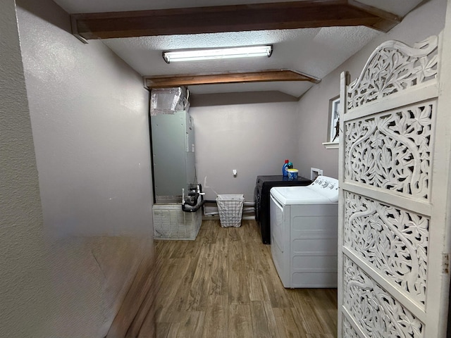 330 Hillcrest Dr, Lumberton, TX 77659 - laundry area with washer and dryer and wood finished floors