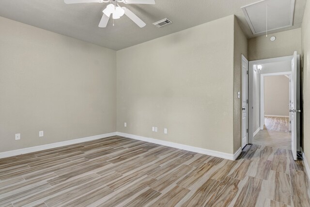 unfurnished room featuring ceiling fan and light hardwood / wood-style floors