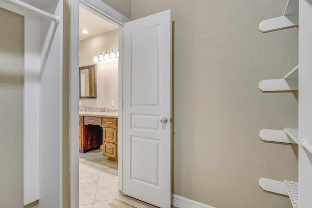 bathroom with vanity and tile patterned floors