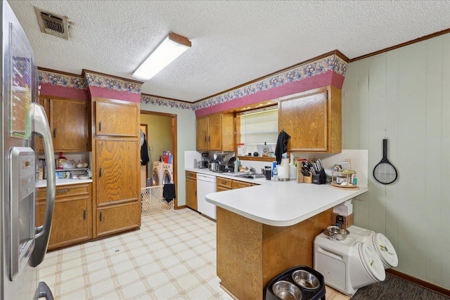 kitchen featuring visible vents, light floors, a peninsula, stainless steel refrigerator with ice dispenser, and white dishwasher