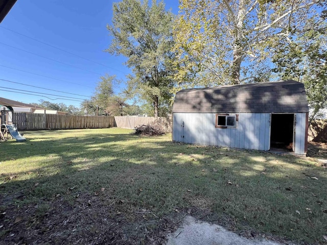 view of yard with a storage unit