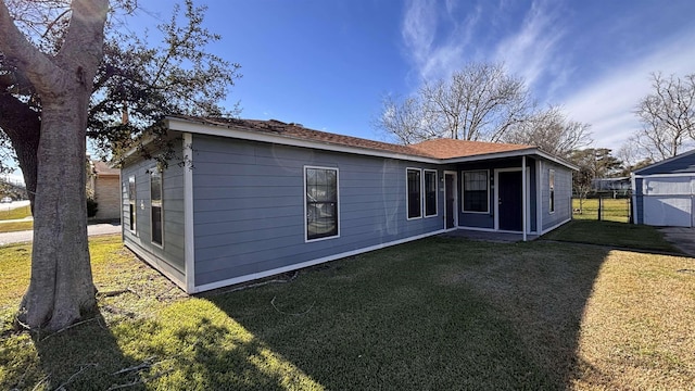 4433 Neches Ave, Port Arthur, TX 77642 - back of house featuring a lawn