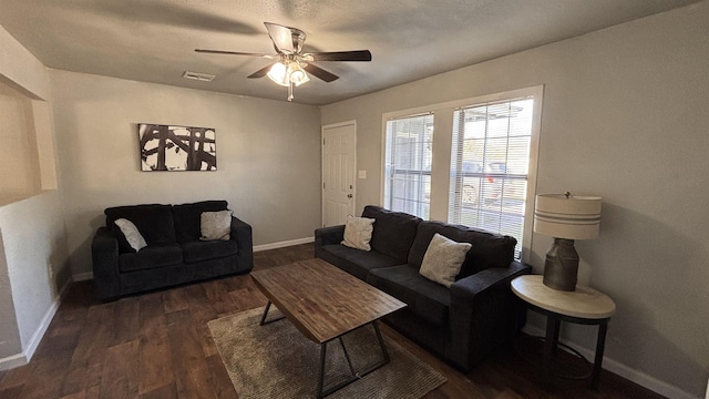 4433 Neches Ave, Port Arthur, TX 77642 - living room with a textured ceiling, ceiling fan, and dark hardwood / wood-style flooring