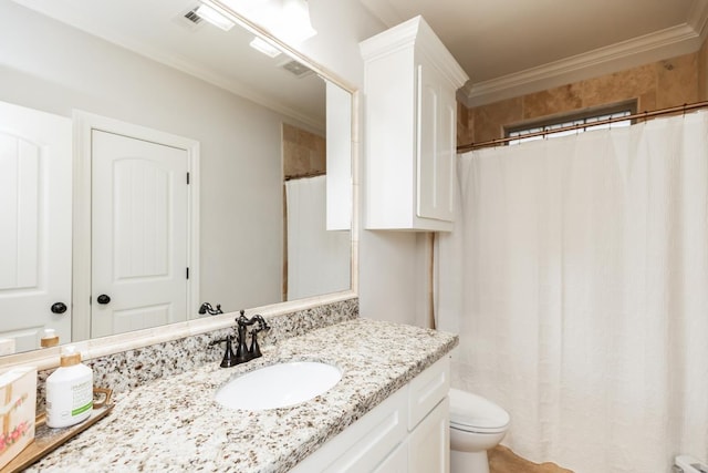 bathroom with toilet, vanity, ornamental molding, and a shower with curtain