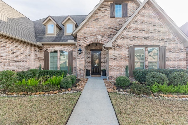 view of front of home with a front yard