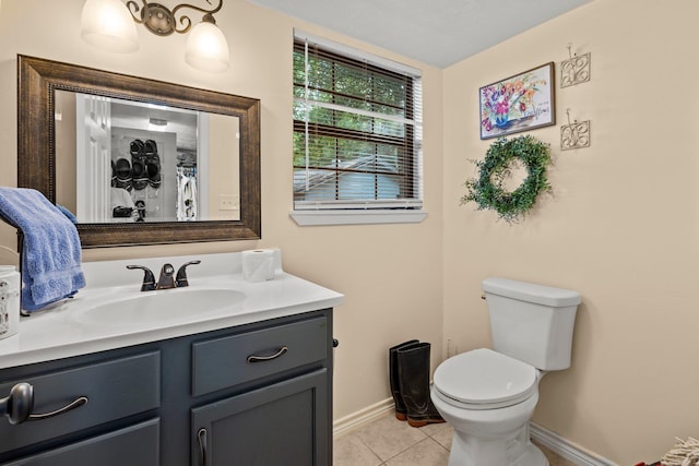 103 Read St, Silsbee, TX 77656 - bathroom with vanity and tile patterned flooring