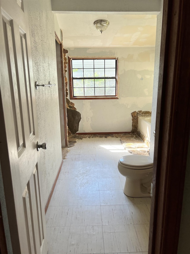 bathroom featuring toilet