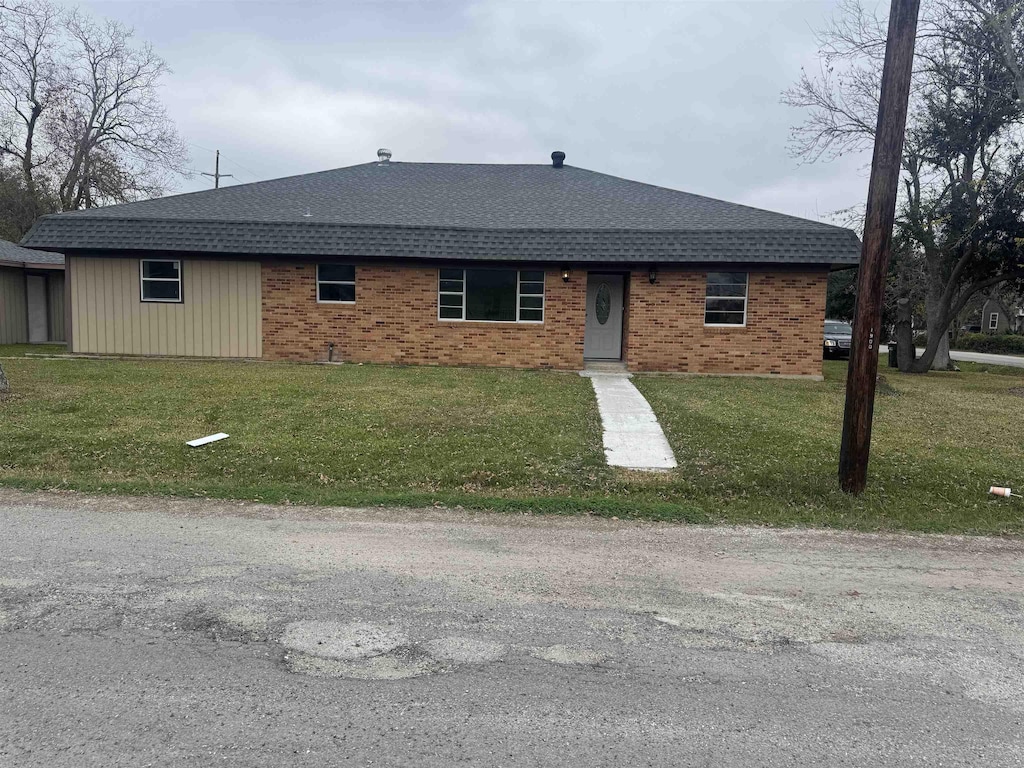 3001 18th St, Port Arthur, TX 77642 - single story home with a front lawn