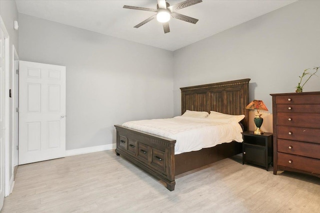 bedroom featuring ceiling fan and light wood-type flooring