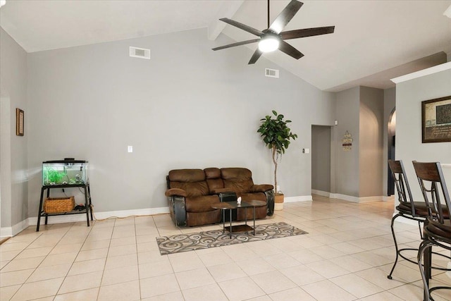 living room with ceiling fan, lofted ceiling with beams, and light tile patterned floors