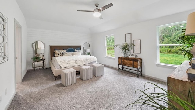 bedroom with baseboards, a ceiling fan, and carpet