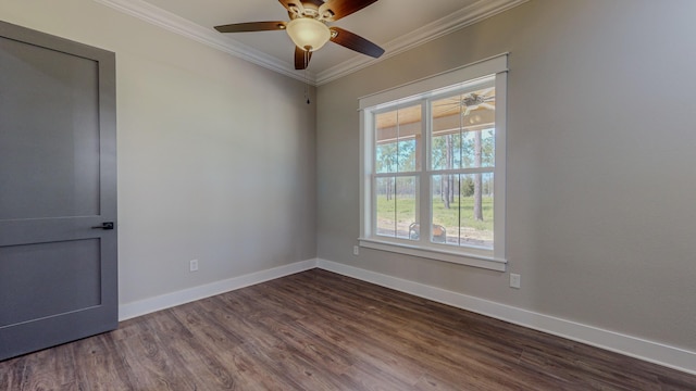 empty room featuring ornamental molding, ceiling fan, and dark hardwood / wood-style flooring