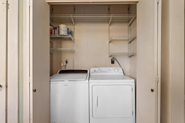 laundry area with independent washer and dryer