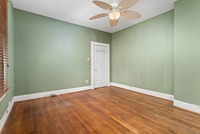 unfurnished room featuring hardwood / wood-style flooring and ceiling fan