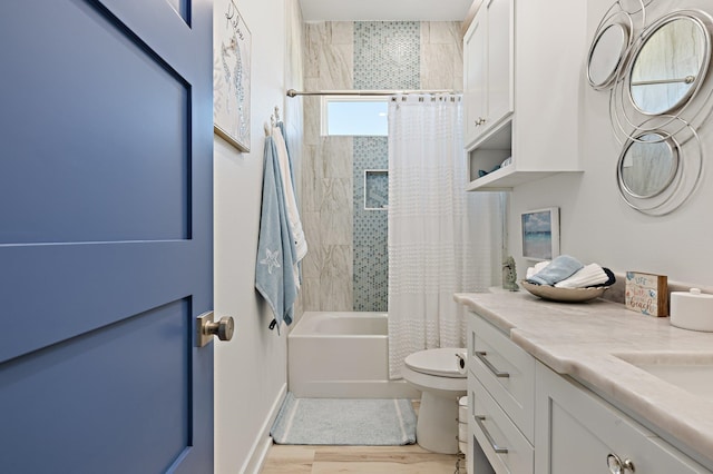 full bathroom with wood-type flooring, vanity, toilet, and shower / bath combo with shower curtain