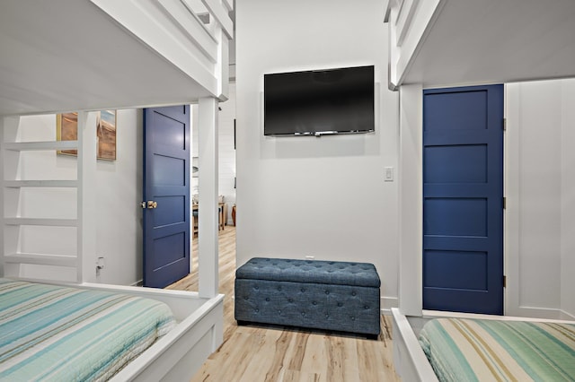 bedroom with light wood-type flooring