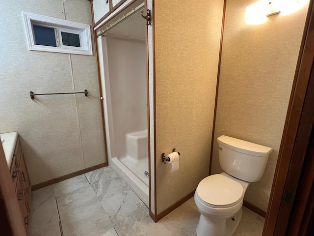 bathroom featuring toilet