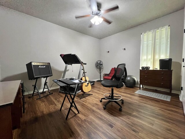 513 Harbor Oaks Dr, Beaumont, TX 77706 - misc room featuring wood finished floors, a ceiling fan, a textured ceiling, and baseboards