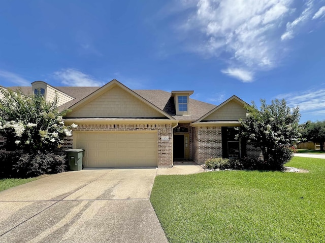 513 Harbor Oaks Dr, Beaumont, TX 77706 - view of front of home featuring a garage, driveway, brick siding, a front lawn, and roof with shingles