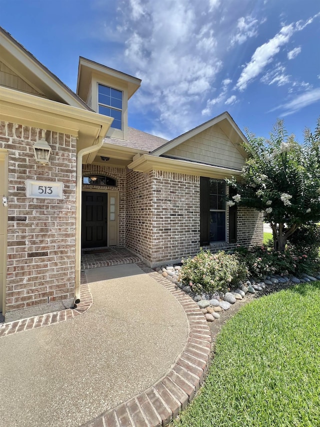 513 Harbor Oaks Dr, Beaumont, TX 77706 - view of exterior entry with brick siding