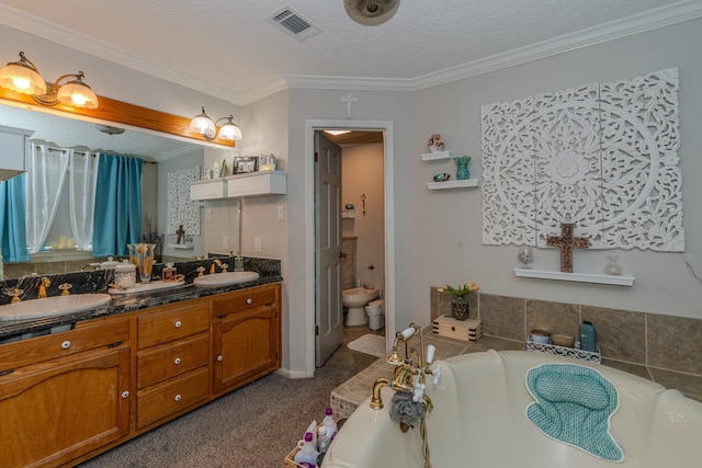 bathroom featuring a tub, a bidet, a textured ceiling, vanity, and ornamental molding