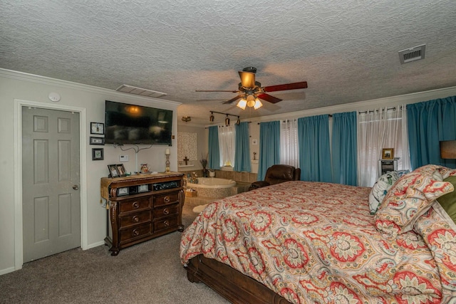 bedroom featuring ceiling fan, light colored carpet, a textured ceiling, and ornamental molding