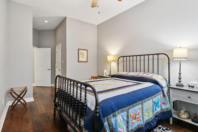 bedroom with ceiling fan and dark hardwood / wood-style floors