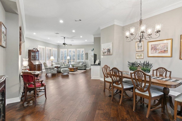 dining area with dark wood-type flooring, ceiling fan with notable chandelier, and ornamental molding