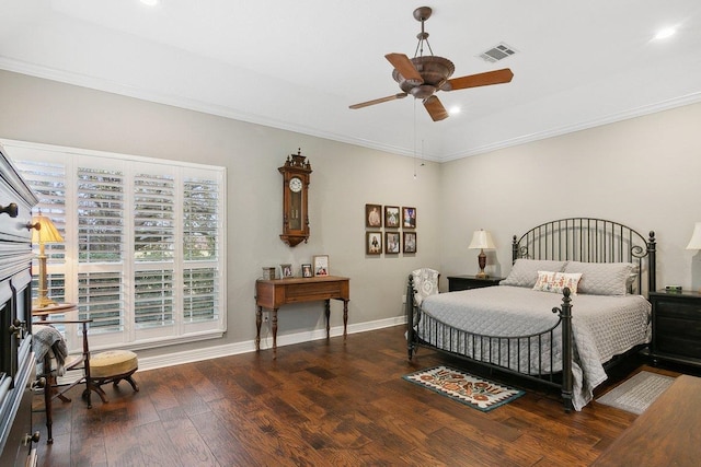 bedroom featuring dark wood-type flooring, ceiling fan, and ornamental molding