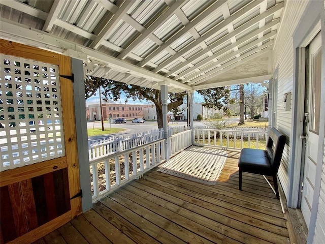 wooden deck featuring covered porch