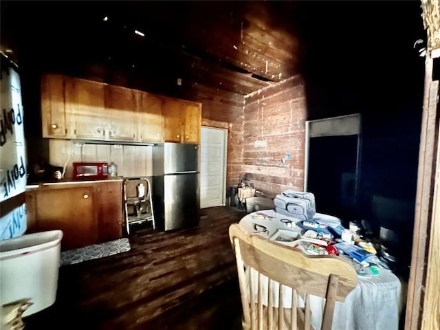 kitchen featuring stainless steel refrigerator