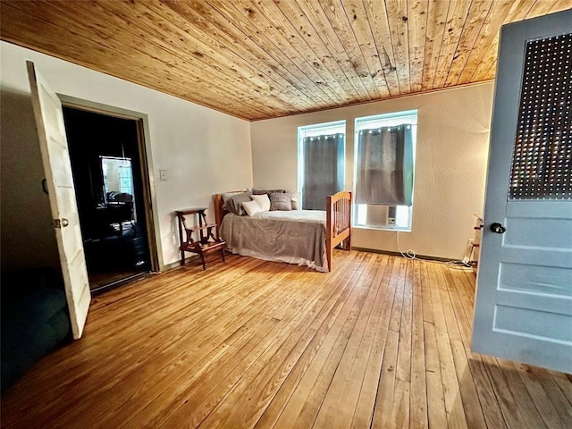 bedroom featuring hardwood / wood-style floors, cooling unit, and wood ceiling