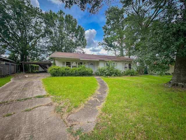 3 Inwood Cir Unit B, Orange, TX 77630 - ranch-style home featuring concrete driveway and an attached carport