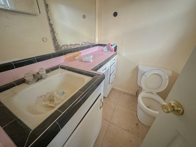 3 Inwood Cir Unit B, Orange, TX 77630 - bathroom with vanity and tile patterned floors