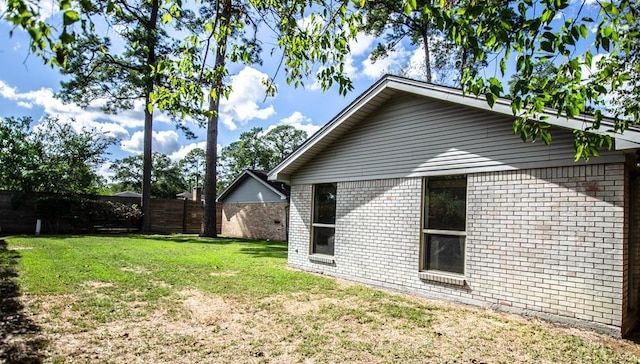 exterior space featuring a lawn