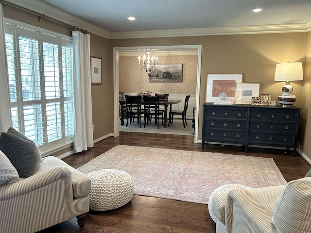 living room featuring a chandelier, crown molding, and dark wood-type flooring