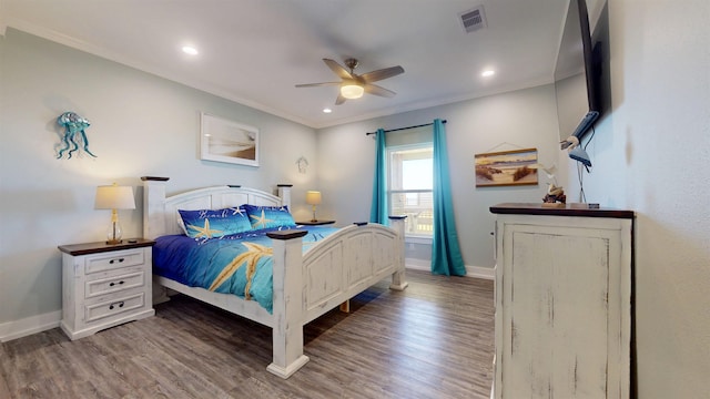335 Atkinson, Crystal Beach, TX 77650 - bedroom with crown molding, baseboards, wood finished floors, recessed lighting, and a ceiling fan