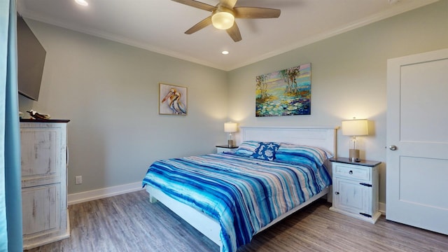 335 Atkinson, Crystal Beach, TX 77650 - bedroom with wood finished floors, crown molding, baseboards, recessed lighting, and a ceiling fan