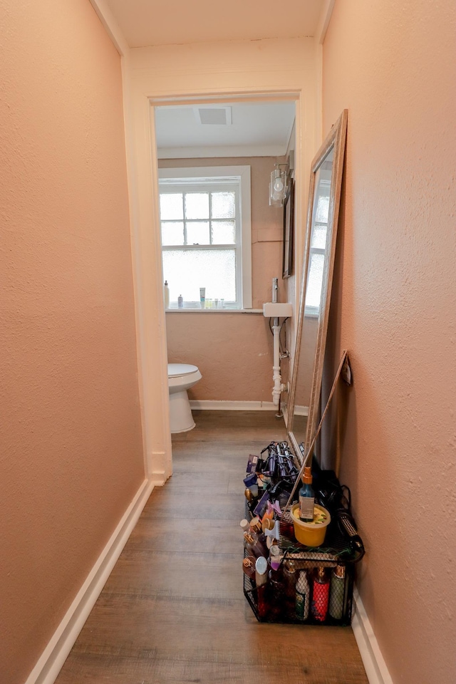 2350 Pecos Blvd, Beaumont, TX 77702 - corridor featuring wood finished floors and baseboards