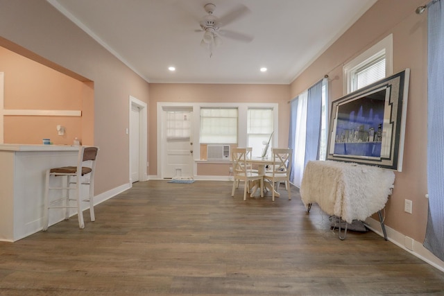 2350 Pecos Blvd, Beaumont, TX 77702 - dining area featuring a ceiling fan, wood finished floors, baseboards, crown molding, and cooling unit