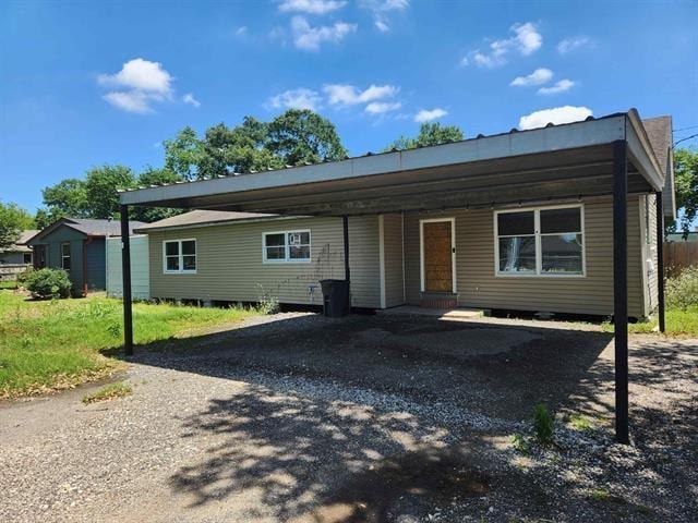 view of front of house with a carport