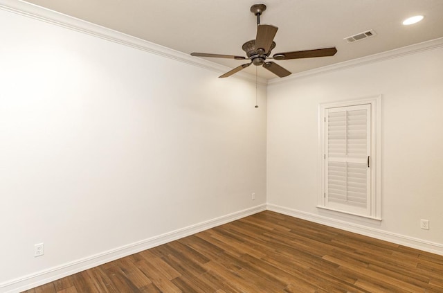 unfurnished room with crown molding, dark hardwood / wood-style floors, and ceiling fan