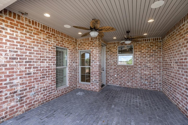 view of patio featuring ceiling fan