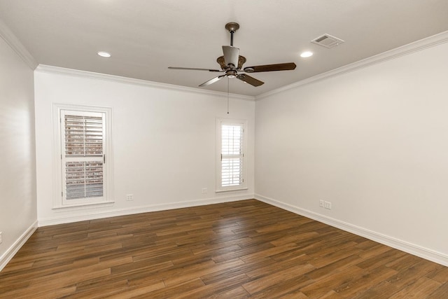 empty room featuring dark wood-type flooring, ceiling fan, and crown molding