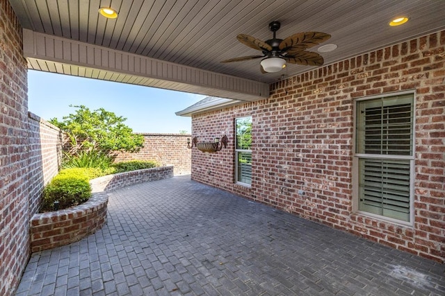 view of patio / terrace featuring ceiling fan