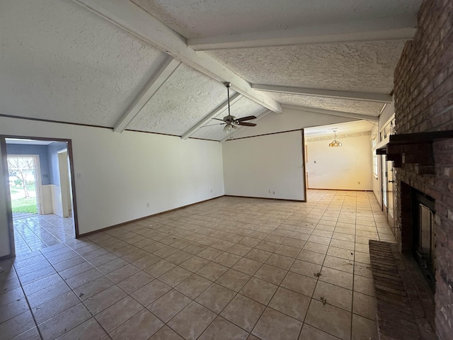 unfurnished living room featuring tile patterned floors, a brick fireplace, vaulted ceiling with beams, a ceiling fan, and a textured ceiling