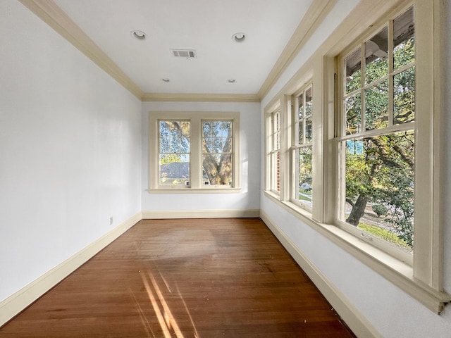 unfurnished sunroom featuring visible vents